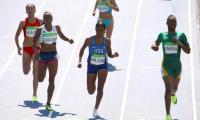 Semenya cruises in 800m heats; Farah survives scare