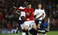 EPL PHOTOS: Man United sink Spurs; Chelsea go top