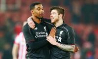 League Cup: Ibe strike helps Liverpool earn vital win at Stoke