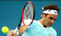 PHOTOS: Champion Federer sets up Raonic final in Brisbane