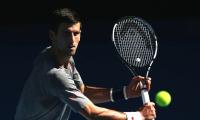 Record-chasing Djokovic ready to rumble in Melbourne heat