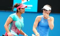 Sania, Bopanna ease into second round at Australian Open