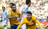 La Liga: Barca back on top after Messi stunner