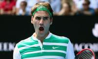 Federer ramps game up to move into Aus Open semis