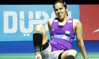 I played with a heavily strapped knee: Saina