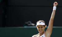 PHOTOS: French Open champ Muguruza knocked out, Murray advances