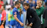 Flamboyant Conte roars out of garage and burns up grass