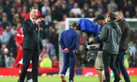 Defiant Van Gaal booed by United fans after season finale