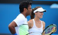 Paes-Hingis knock out fourth seeds, enter mixed doubles quarters