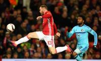 PHOTOS: Rooney ignites Man Utd; Inter slump out of Europe