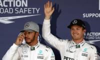 Rosberg fends off Hamilton to seize pole in Japan