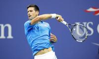 PHOTOS: Djokovic shakes off rust, to face Tsonga in quarters