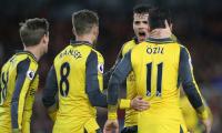 Arsenal keep Champions League hopes alive with Boro win