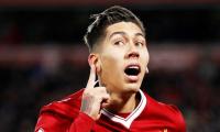 EPL PHOTOS: Firmino strikes twice as Liverpool crush Swansea