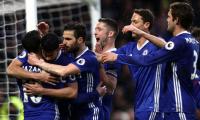 Chelsea surge 11 points clear, Leicester into bottom three