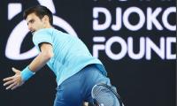 Djokovic faces huge test as he opens Australian Open defence