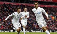 Liverpool title challenge dented by Swansea