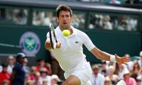 Wimbledon PHOTOS: Djokovic, Federer and Kerber advance