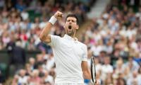 Djokovic eases past Mannarino into Wimbledon last eight