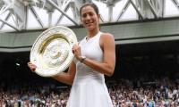 Will Wimbledon victory change Muguruza's life?