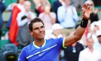 PHOTOS: Nadal crushes Thiem to set up Wawrinka showdown