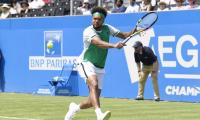 Kyrgios retires from Queen's; Tsonga advances