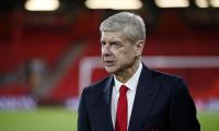 Under fire at Arsenal, Wenger linked to Barcelona move
