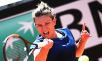 Halep, Muguruza through to Italian Open semis