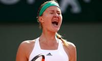 Mladenovic beats pain and Brady to advance