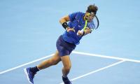 China Open: Nadal survives Pouille fright to advance