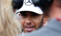 Japanese GP: Dominant Hamilton seizes pole with record lap