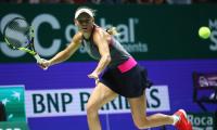 WTA Finals: Dominant Wozniacki swats aside Halep