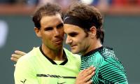 Federer and Nadal move within sight of landmark meeting