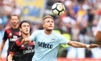 Football Briefs: Immobile hat-trick destroys Milan's perfect record