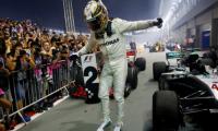 Singapore GP: Hamilton wins after Vettel crashes out