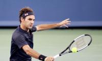 Federer overcomes sluggish start to brush aside Struff in Basel