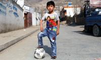 Afghan 'Messi boy' forced to flee home