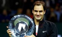 Federer cruises past Dimitrov to claim Rotterdam title