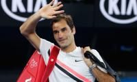 PHOTOS: Dominant Federer into Australian Open final after Chung retires