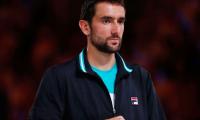 Cilic blames closed roof for slow start against Federer