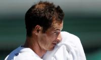 Murray withdraws from Wimbledon with heavy heart