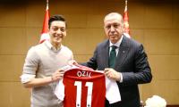 German soccer star Ozil defends photo with Erdogan