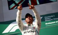 Hamilton wins in Hungary to stretch F1 title lead