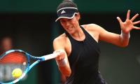 French Open PIX: Muguruza thrashes Sharapova, Halep powers past Kerber