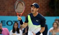 Tennis: Murray's comeback ends in defeat; Federer cruises