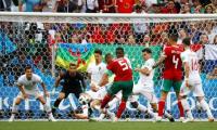 Ponderous Portugal spared embarrassment by Morocco's profligacy