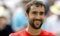 Tennis: Cilic sets up Djokovic final; Federer in Halle final