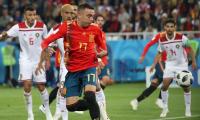 WC PIX: Spain snatch late draw with Morocco to top group