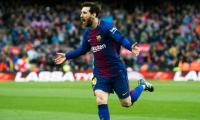 Messi gem lifts Barcelona eight points clear of Atletico