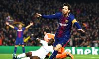 King Messi lights up Nou Camp with 100th Champions League goal